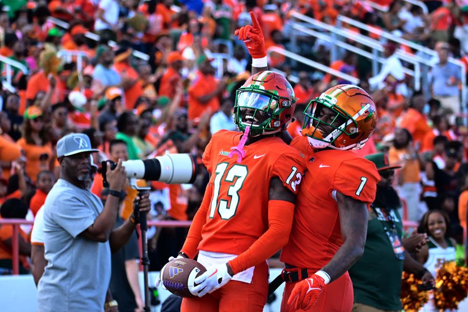 Florida A&M defensive backs Jalen Glaze (left) and Lovie Jenkins celebrates Glaze's first college interception against the Prairie View A&M Panthers at the Rattlers' homecoming football game at Ken Riley Field at Bragg Memorial Stadium in Tallahassee, Florida on Saturday, October 28, 2023.