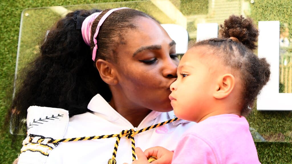 This photo from last January shows tennis champ Serena Williams celebrates with daughter Alexis Olympia after winning a match in Auckland, New Zealand. (Photo by Hannah Peters/Getty Images)