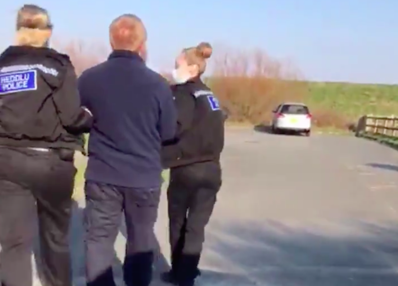 Radek Kotlarek's arrest at Talacre beach in Wales on Sunday was caught on video. (Reach)