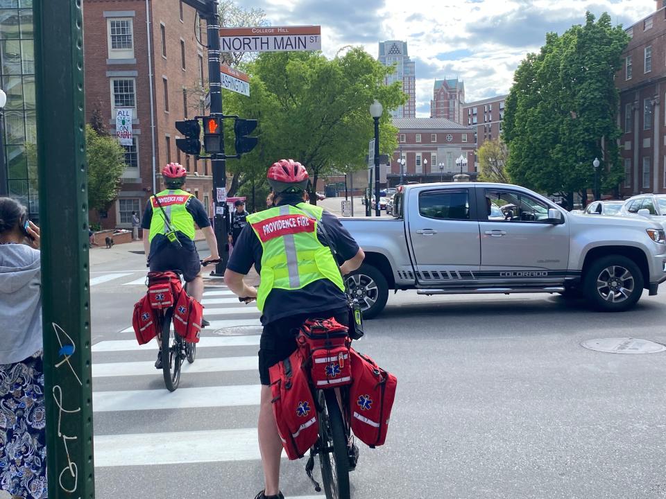 Providence Firefighter Grayson Smith and fire Lt. Matthew Kiley navigate North Main Street on their patrol bikes last week.