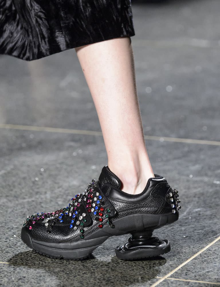 <p>Taking the ugly shoe trend to new heights, Christopher Kane put his own <em>fashun</em> twist on orthopedic shoes for brand's Fall 2018 collection. And the sneaker-like shoes didn't just look like orthopedic shoes-they were actually a collaboration with orthopedic footwear brand <a rel="nofollow noopener" href="https://www.zcoil.com/" target="_blank" data-ylk="slk:Z-Coil;elm:context_link;itc:0;sec:content-canvas" class="link ">Z-Coil</a>. </p>