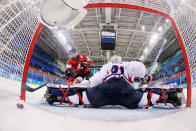 <p>Lara Stalder #7 of Switzerland scores a goal against So Jung Shin #31 of Korea in the third period during the Women’s Ice Hockey Preliminary Round – Group B game on day one of the PyeongChang 2018 Winter Olympic Games at Kwandong Hockey Centre on February 10, 2018 in Gangneung, South Korea. (Photo by Bruce Bennett/Getty Images) </p>