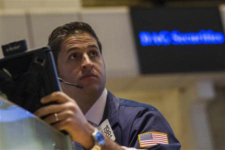 A trader works on the floor of the New York Stock Exchange, November 4, 2013. REUTERS/Brendan McDermid