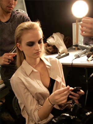 A model prepping for Vera Wang's fall 2011 show during New York Fashion Week