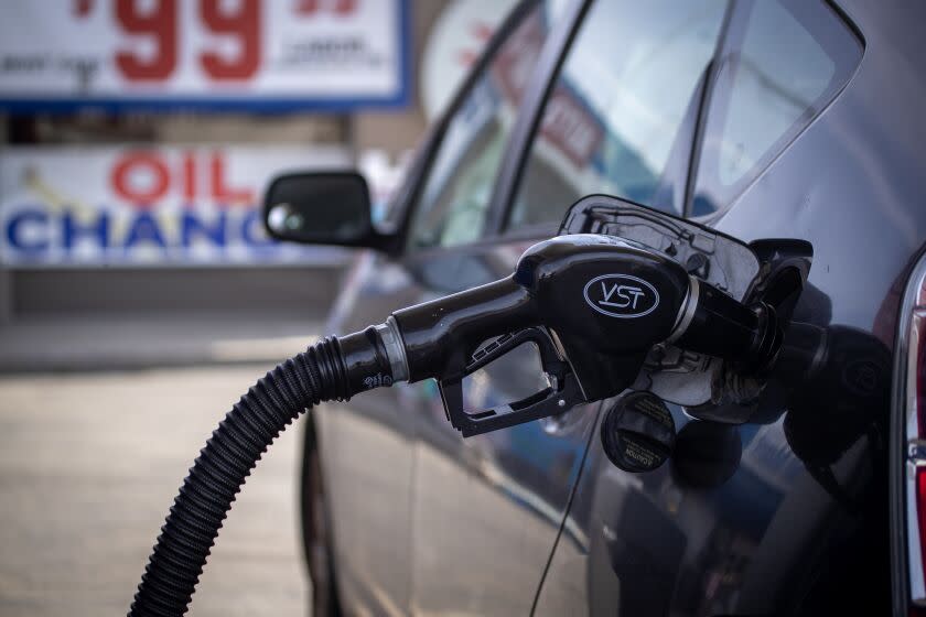 Huntington Beach, CA - February 16: A motorist fills up their Toyota Prius at a Mobile gas station on Beach Blvd. in Huntington Beach Thursday, Feb. 16, 2023. (Allen J. Schaben / Los Angeles Times)