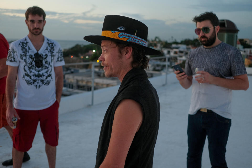 Brock Pierce, center, with Josh Boles, left, and Matt Clemenson on the roof of the Monastery Art Suites, which they rented out as a headquarters for their cryptocurrency business, in San Juan, Puerto Rico, January 2018. Dozens of entrepreneurs, made newly wealthy by virtual currencies, moved to the island to avoid taxes and to build a society that runs on blockchain.<span class="copyright">José Jiménez-Tirado—The New York Times/Redux</span>