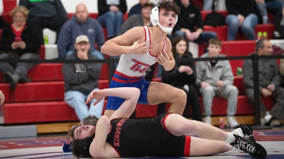 Washington Township's Michael Horn celebrates after pinning Kingsway's Nicholas Markizon during the 138 lb. bout of the wrestling meet held at Washington Township High School on Wednesday, January 10, 2024.