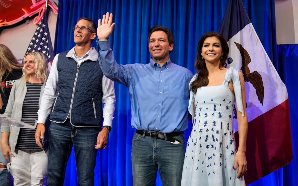 Mr DeSantis and his wife Casey addressing the Republican party faithful in Iowa earlier in May - Charlie Neibergall
