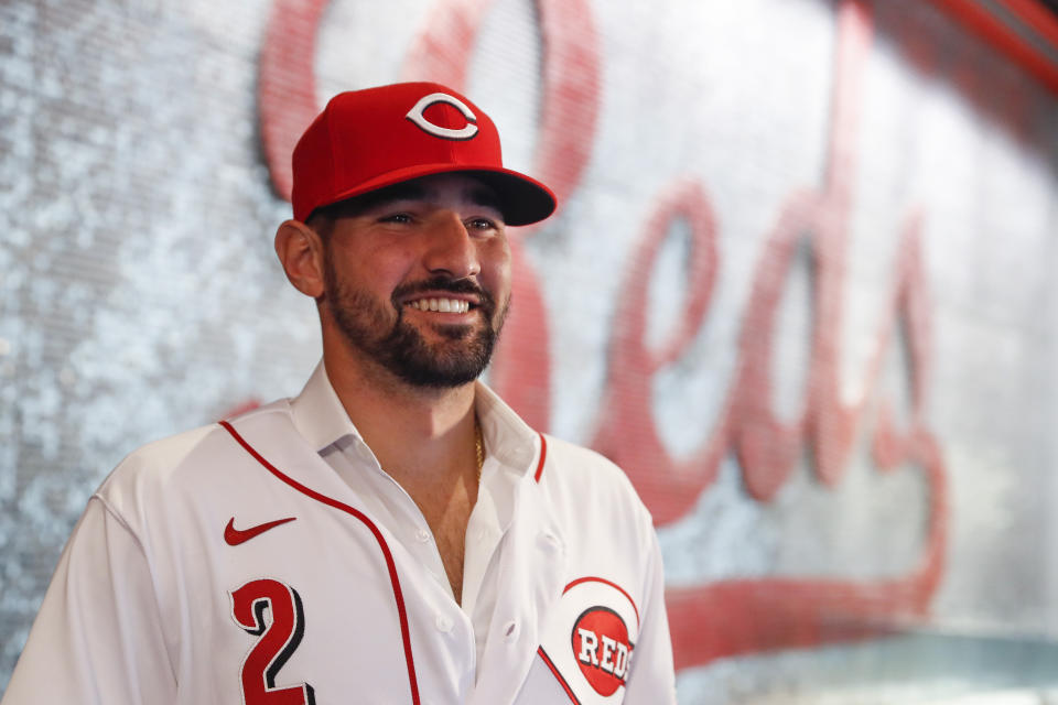 Cincinnati Reds' Nick Castellanos waits for interviews during a news conference, Tuesday, Jan. 28, 2020, in Cincinnati. Castellanos signed a $64 million, four-year deal with the baseball club. (AP Photo/John Minchillo)