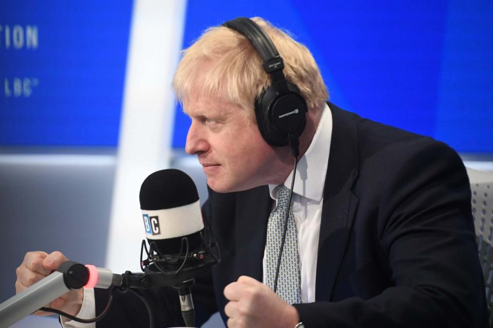 Under the spotlight: Boris Johnson answers questions in a live radio phone-in on LBC today (Jeremy Selwyn)