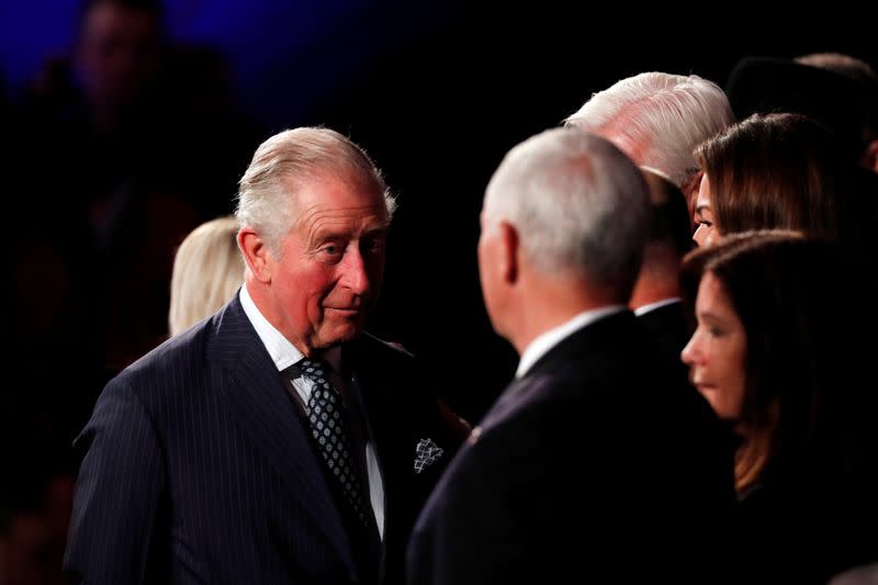 Britain's Prince Charles speaks to U.S. Vice President Mike Pence during the World Holocaust Forum marking 75 years since the liberation of the Nazi extermination camp Auschwitz, at Yad Vashem Holocaust memorial centre in Jerusalem