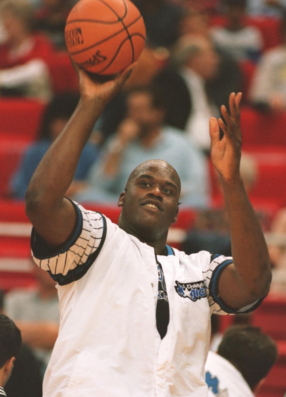 Shaquille O'Neal shoots during warm-ups before a 101-99 loss to the New York Knicks in Orlando, Florida.