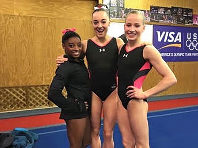 <p>Courtesy Maggie Nichols</p> Former USA gymnast Maggie Nichols (center) with teammates Simone Biles and Madison Kocian in 2015.