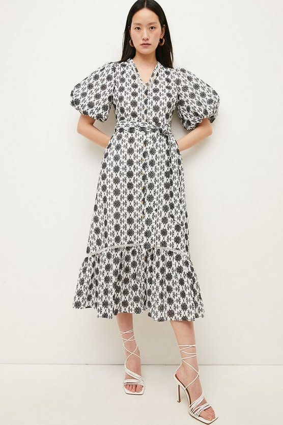 The Holly Effect: The Karen Millen dress has sold out in Blue, but is available in Black and White. (Karen Millen)