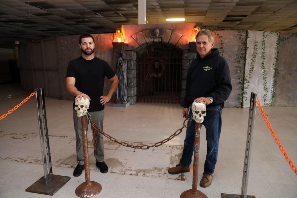 Pat and Connor Costello, father and son, prepare for their haunted attraction called Scared by the Sound in the long vacant Kmart in Yorktown Sept. 30, 2022. Pat Costello started Scared by the Sound after doing up his own home for his kids for decades; then at Playland for 20 years.