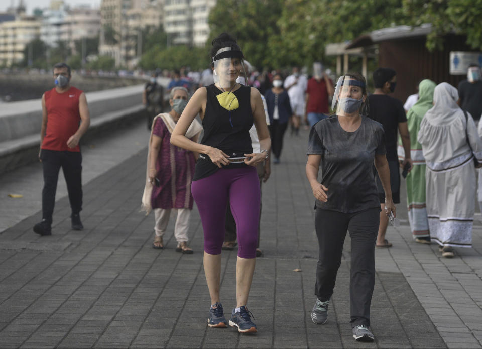 MUMBAI, INDIA - JUNE 7: Huge crowd walks at Marine drive during the first phase of Unlock 1.0, on June 7, 2020 in Mumbai, India. (Photo by Satyabrata Tripathy/Hindustan Times via Getty Images)