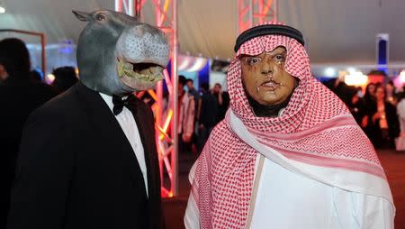 Two persons are wearing masks as they take part in Comic Con expo in Jeddah, Saudi Arabia February 18, 2017. REUTERS/Ali al-Qarni