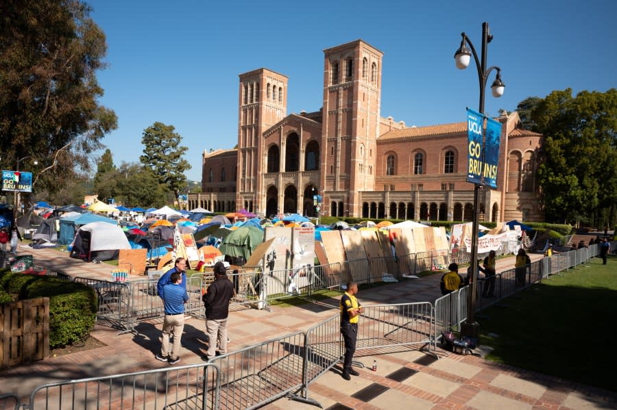 Westwood, CA – April 29:Pro-Palestinian protesters continued to occupy the grounds at UCLA in front of Royce Hall on Monday, April 29, 2024. Security has surrounded the encampment after a skirmish broke out Sunday between the Pro-Palestianian protesters and Israel supporters. (Photo by David Crane/MediaNews Group/Los Angeles Daily News via Getty Images)
