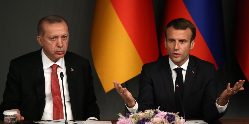 ISTANBUL, TURKEY - OCTOBER 27: (RUSSIA OUT) Turkish President Recep Tayyip Erdogan (L) and French President Emmanuel Macron (R) attend their joint press conference at the Summit on October 27, 2018 in Istanbul, Turkey. Leaders of Germany, France, Russia and Turkey have gathered in Istanbul for a one-day summit on Syrian crisis. (Photo by Mikhail Svetlov/Getty Images)