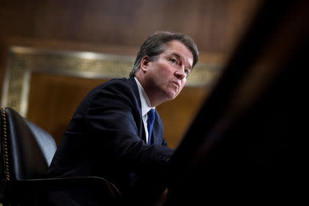 FILE PHOTO: Judge Brett Kavanaugh testifies during the Senate Judiciary Committee hearing on his nomination to be an associate justice of the Supreme Court of the United States, on Capitol Hill in Washington, DC, U.S., September 27, 2018. Tom Williams/Pool via REUTERS