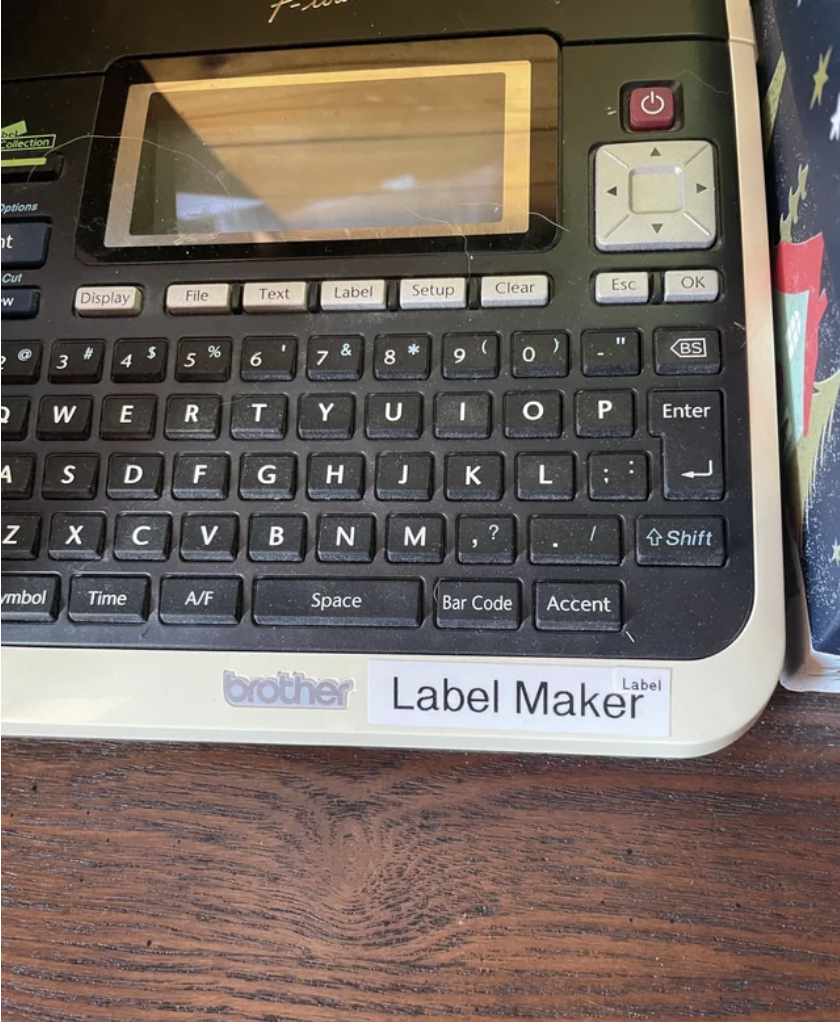 A label-maker marked "Label Maker" and "Label" on the label
