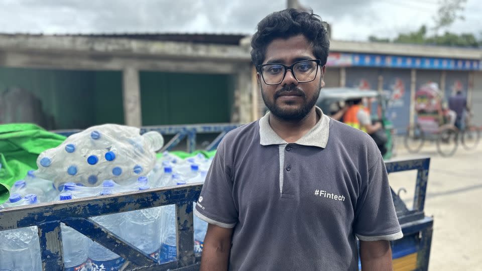 Yasin Arafat came from Dhaka to find his family but couldn't source a boat to rescue them. - CNN/Rebecca Wright