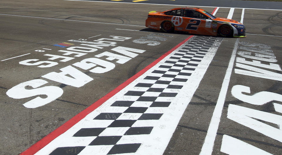 Brad Keselowski drives past the start/finish line during a NASCAR Cup Series auto race Sunday, Sept. 16, 2018, in Las Vegas. (AP Photo/Isaac Brekken)