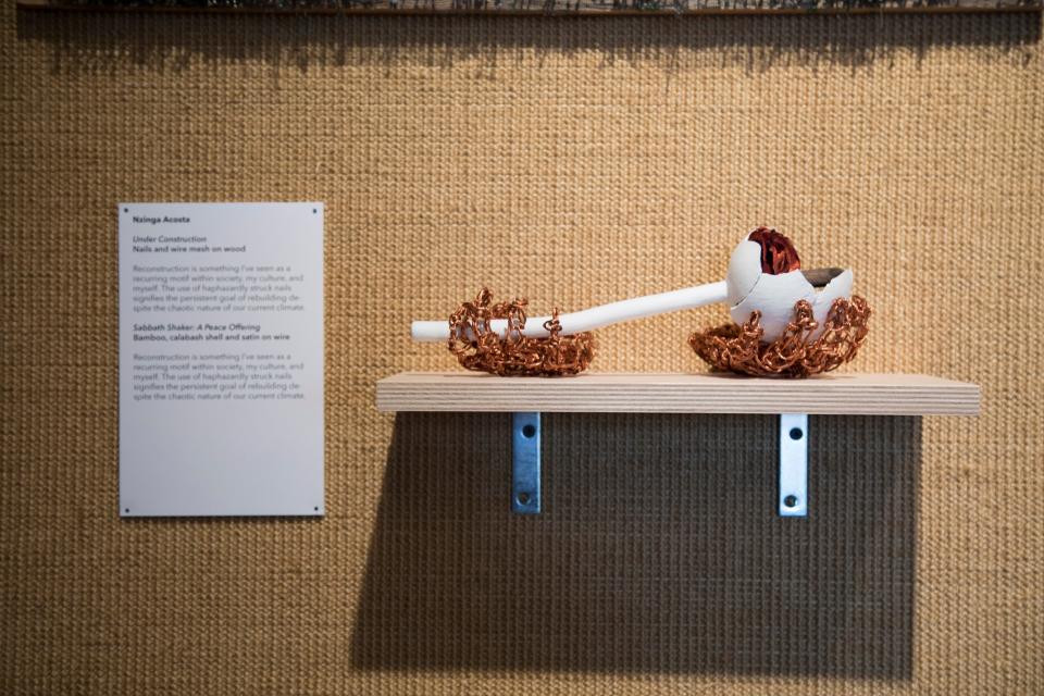 A sculpture, "Under Construction" by Rufus King student Nzinga Acosta, is displayed at an exhibit at Charles Allis Art Museum in May 2018.