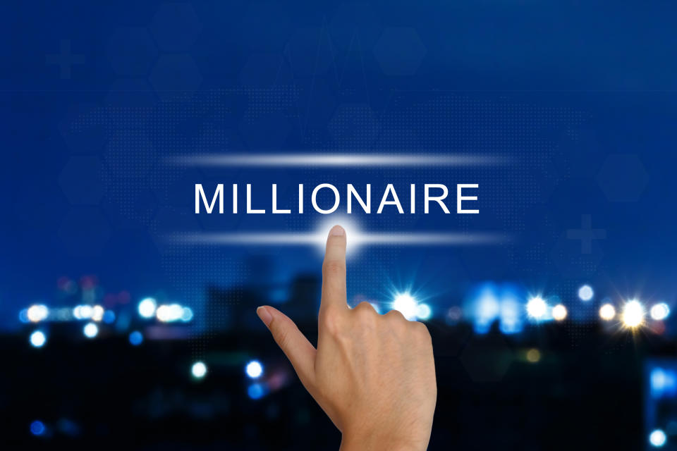 A hand is shown, with its finger pointing to the word millionaire.