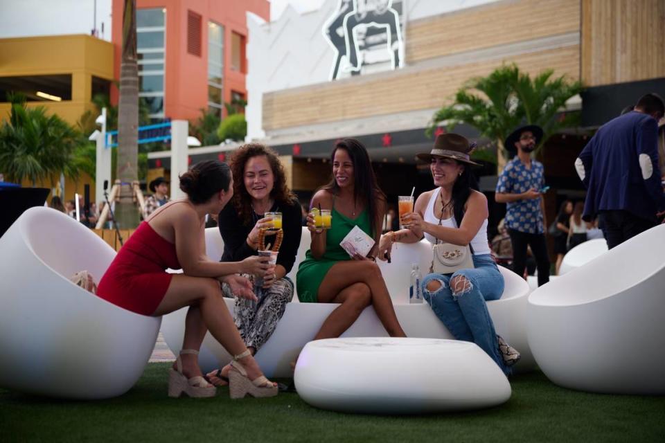 Guests enjoy a drink at the Dolphin Mall’s Vivo Plaza, which features three bars and a Sergio’s.