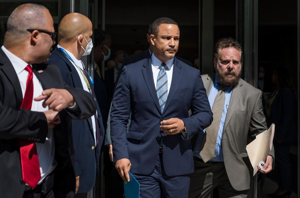 Breon Peace (C), the United States Attorney for the Eastern District of New York, walks to a press conference outside of the United States Courthouse after former R&B singer R. Kelly was sentenced to 30 years in prison after his conviction last year on federal racketeering and sex trafficking charges in the Brooklyn borough of New York, New York, USA, 29 June 2022. (EPA)