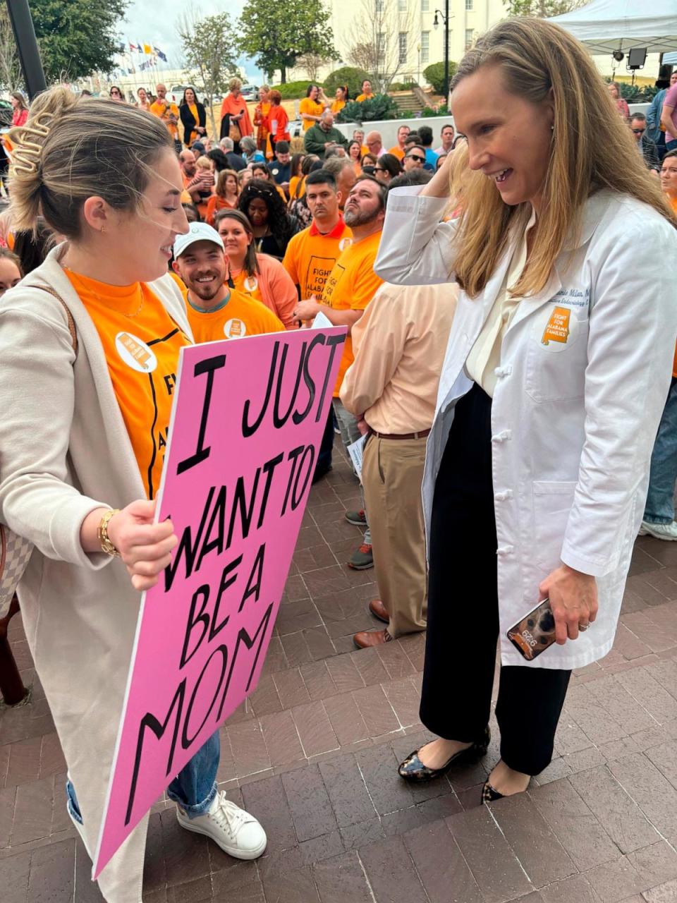 PHOTO: Hannah Miles of Birmingham speaks with Dr. Mamie McLean outside the Alabama Statehouse in Montgomery, Ala., on Feb. 28, 2024. They were among patients and doctors urging Alabama lawmakers to take action to get IVF services in the state.  (Kim Chandler/AP)