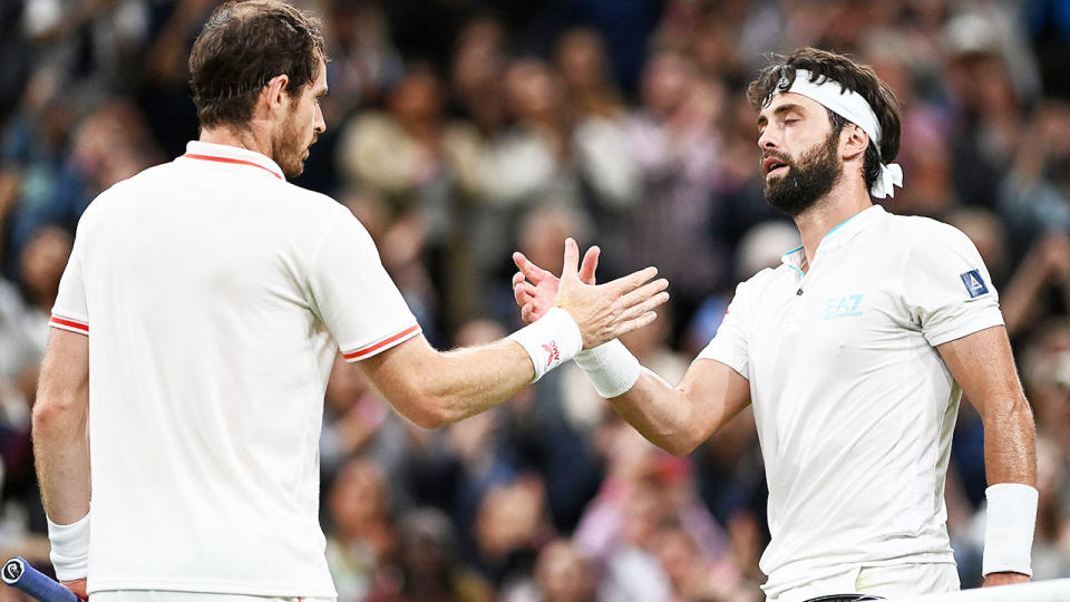 Andy Murray, pictured here embracing Nikoloz Basilashvili after their match at Wimbledon.