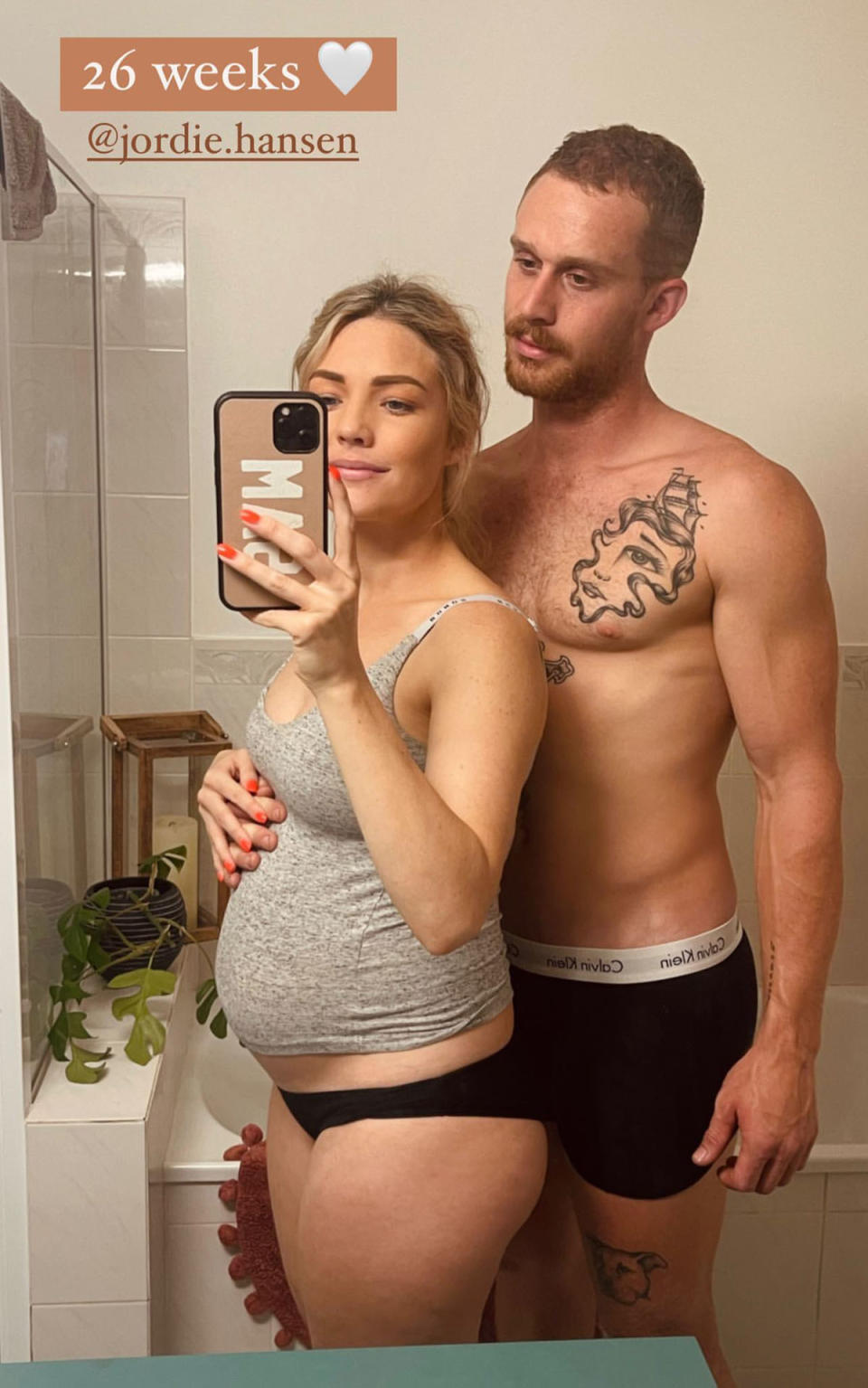 Sam Frost and Jordie Hansen take a mirror snap in their underwear showing off Sam's 26 week baby bump