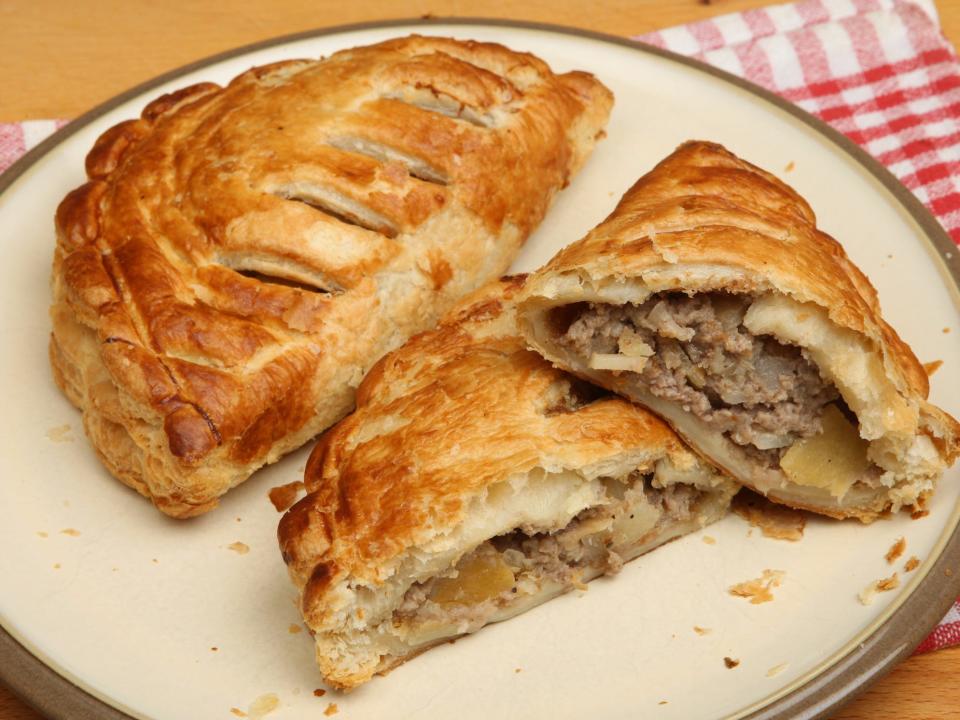 A Cornish pasty on a plate.
