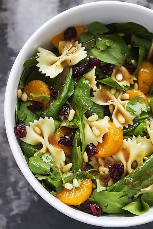 <p>Le Creme de La Crumb</p><p>This mandarin pasta spinach salad with teriyaki dressing is easy, quick, healthy, and tossed in the most addictive teriyaki vinaigrette dressing!</p><p><strong>Get the recipe: <a href="https://www.lecremedelacrumb.com/mandarin-pasta-spinach-salad-with-teriyaki-dressing/" rel="nofollow noopener" target="_blank" data-ylk="slk:Mandarin Pasta Spinach Salad with Teriyaki Dressing;elm:context_link;itc:0;sec:content-canvas" class="link ">Mandarin Pasta Spinach Salad with Teriyaki Dressing</a></strong></p>