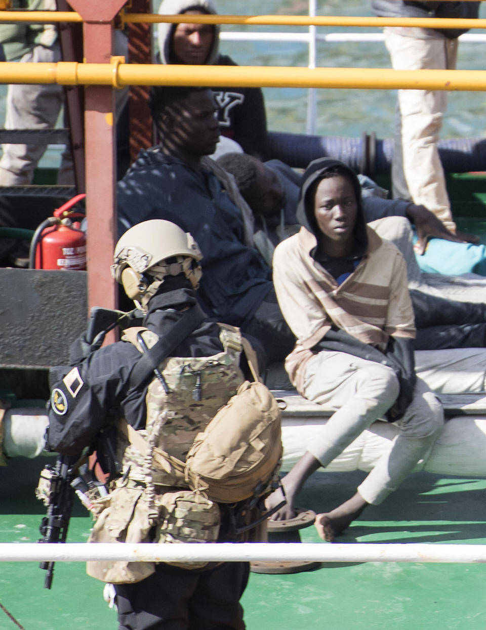 Armed forces stand onboard the Turkish oil tanker El Hiblu 1, which was hijacked by migrants, in Valletta, Malta, Thursday March 28, 2019. A Maltese special operations team on Thursday boarded a tanker that had been hijacked by migrants rescued at sea, and returned control to the captain, before escorting it to a Maltese port. (AP Photo/Rene' Rossignaud)