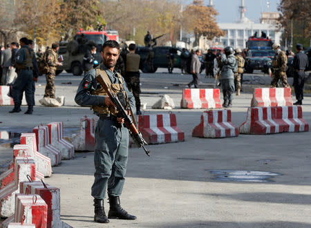 Afghan policemen keep watch at the site of a blast in Kabul, Afghanistan November 12, 2018. REUTERS/Omar Sobhani