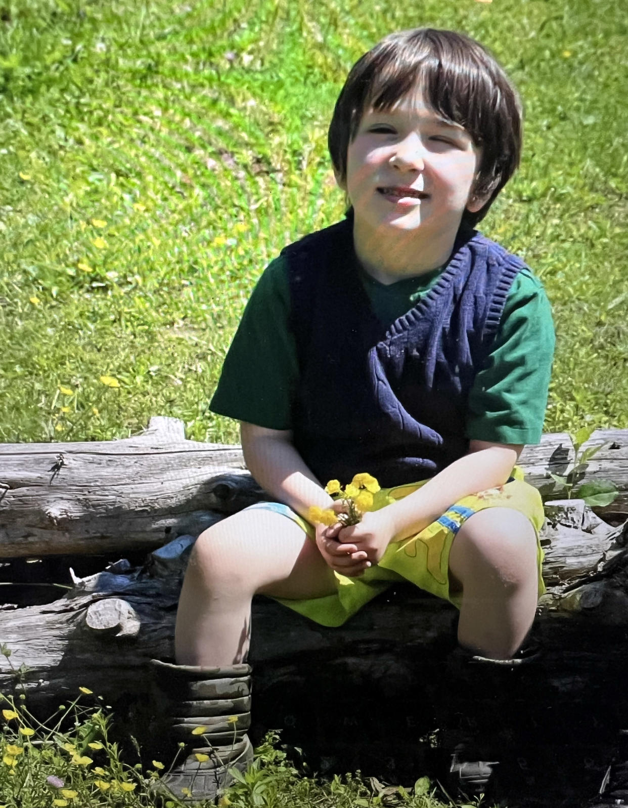 Jesse Lewis, wearing his favorite camo winter boots in the summertime. (Courtesy Scarlett Lewis)