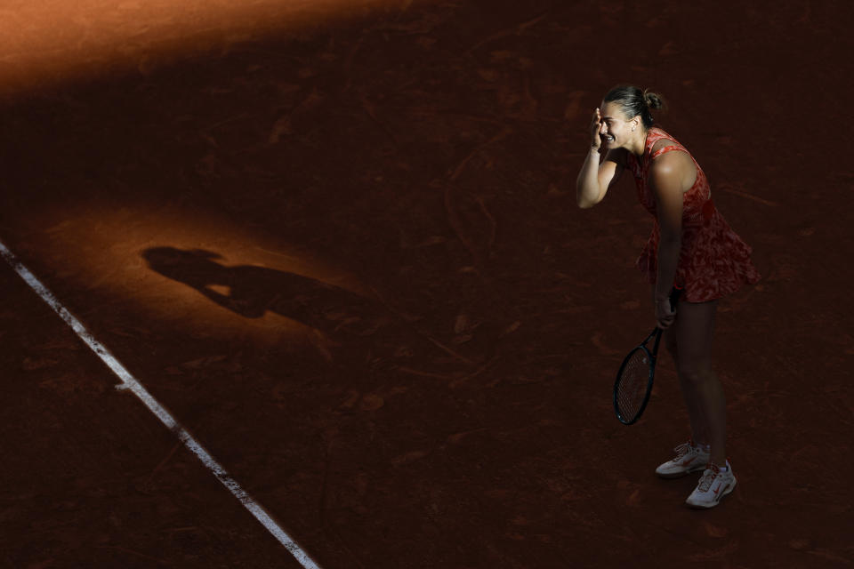 Aryna Sabalenka of Belarus reacts after missing a shot against Russia's Mirra Andreeva during their quarterfinal match of the French Open tennis tournament at the Roland Garros stadium in Paris, Wednesday, June 5, 2024. (AP Photo/Aurelien Morissard)