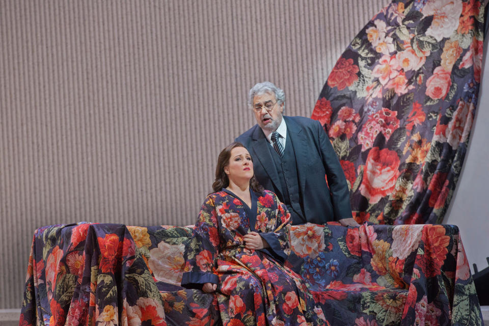 In this March 11, 2013 photo provided by the Metropolitan Opera Diana Damrau performs as Violetta with Placido Domingo as Giorgio Germont in a scene Verdi's "La Traviata" during a rehearsal at the Metropolitan Opera in New York. (AP Photo/ Metropolitan Opera, Ken Howard)