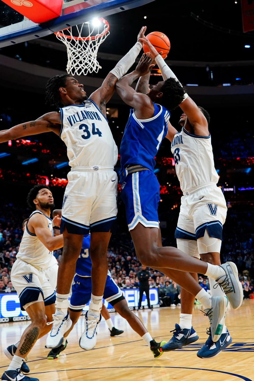 Seton Hall Pirates forward Tyrese Samuel (middle) shoots the ball against Villanova Wildcats forward Brandon Slater (34)