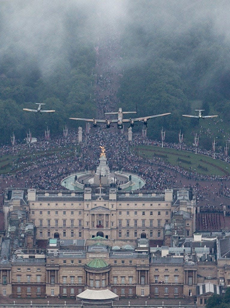 <p>Spitfires of the Battle of Britain Memorial Flight fly over the ceremony.</p>