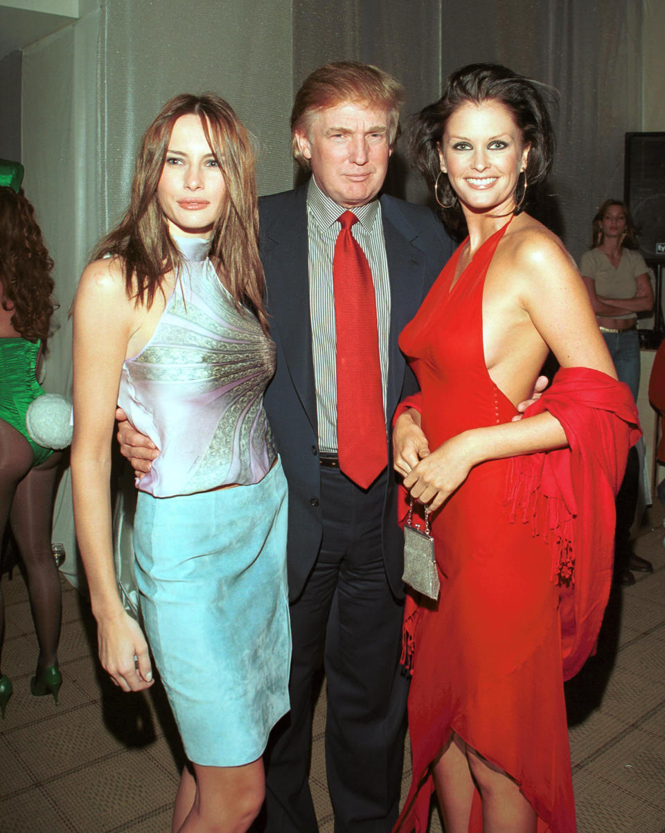 <p>Donald Trump with girlfriend Melania Knauss, left, and Kylie Bax attend a party at the Playboy Penthouse in New York City on Sept. 6, 2000. (Photo: Steve Azzara/Corbis via Getty Images) </p>
