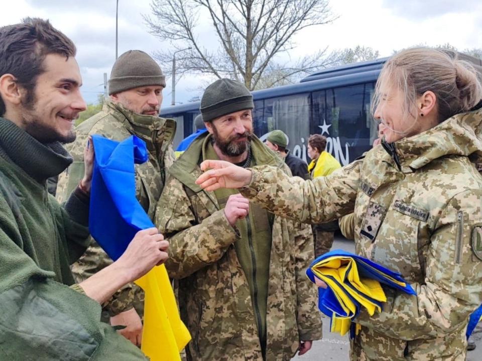 Ukrainian prisoners of war (POWs) are seen after swap, amid Russia's attack on Ukraine, at an unknown location (via REUTERS)