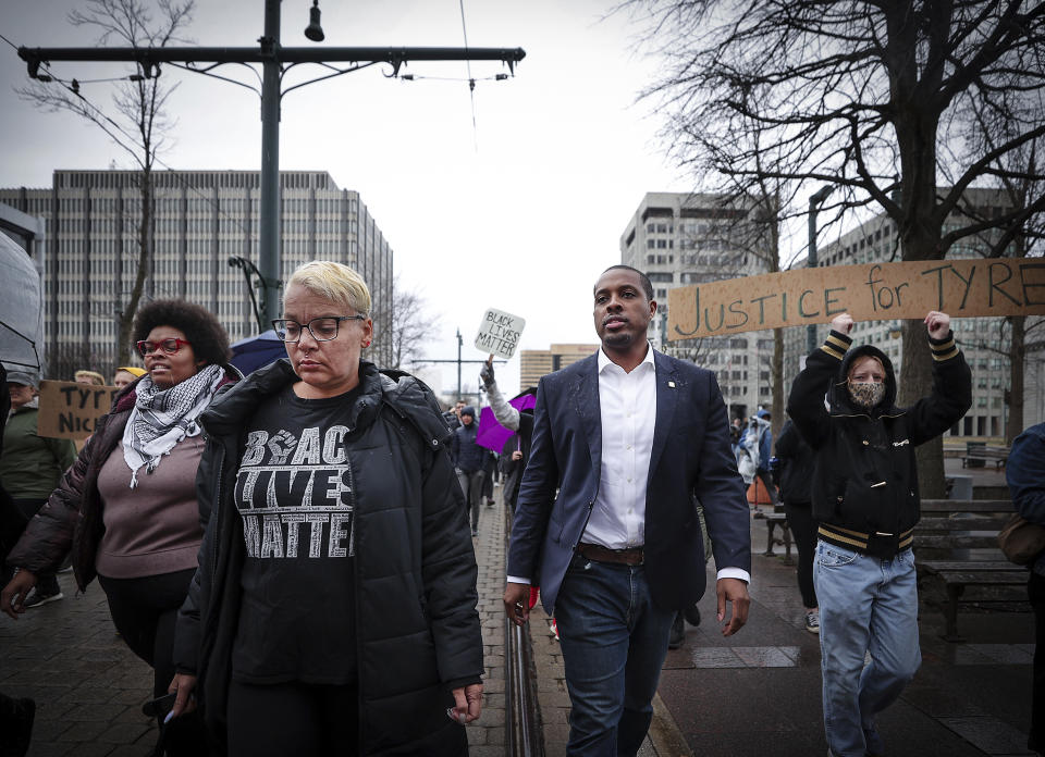 Memphis City Councilman JB Smiley Jr., center, marches with local activists demanding justice for Tyre Nichols, who died after being beaten by Memphis police during a traffic stop, in Memphis, Tenn., on Saturday, Jan. 28, 2023. (Patrick Lantrip/Daily Memphian via AP)