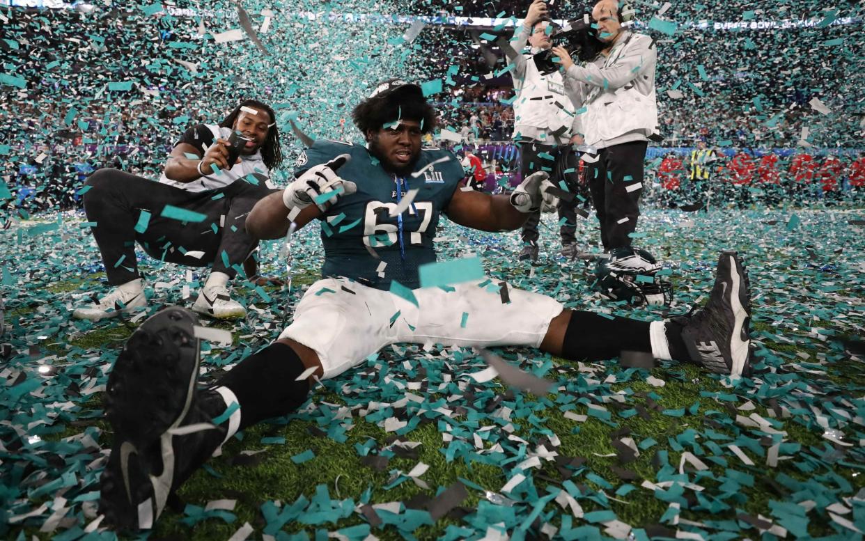 Philadelphia Eagles v New England Patriots - Super Bowl LII - U.S. Bank Stadium, Minneapolis, Minnesota, U.S. - February 4, 2018. Philadelphia Eaglesâ€™ Chance Warmack celebrates winning Super Bowl LII. - REUTERS/Chris Wattie