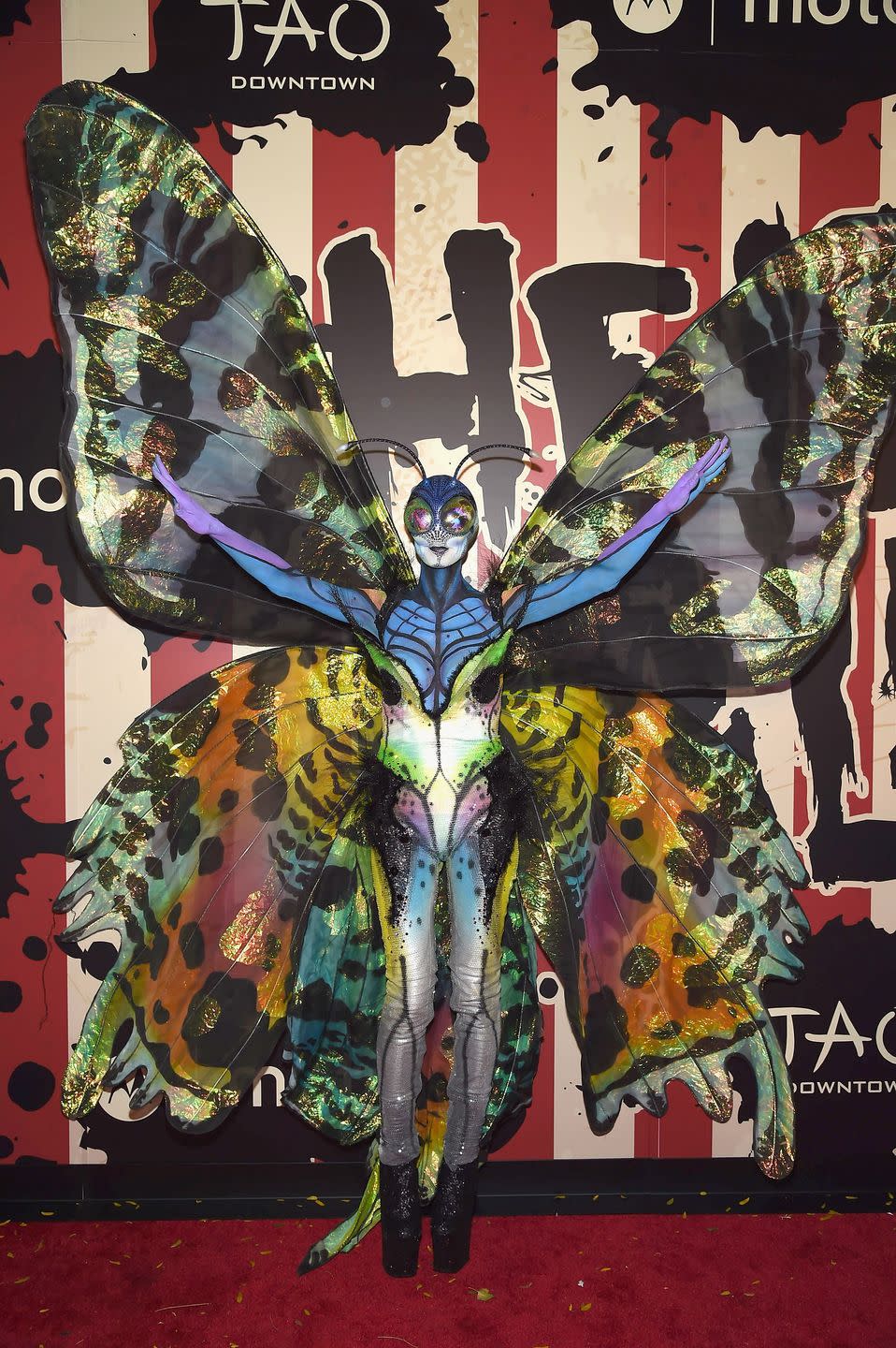 <p>Um, did we just take a trip to Cirque de Soleil?! Heidi waltzed through the streets of New York City in this bold and beautiful butterfly costume, massive wingspan included. </p>
