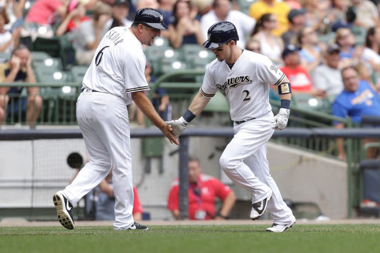 MILWAUKEE, WI - AUGUST 11: Scooter Gennett #2 of the Milwaukee Brewers runs the bases after hitting a solo home run during the third inning against the Atlanta Braves at Miller Park on August 11, 2016 in Milwaukee, Wisconsin. (Photo by Mike McGinnis/Getty Images) *** Local Caption *** Scooter Gennett