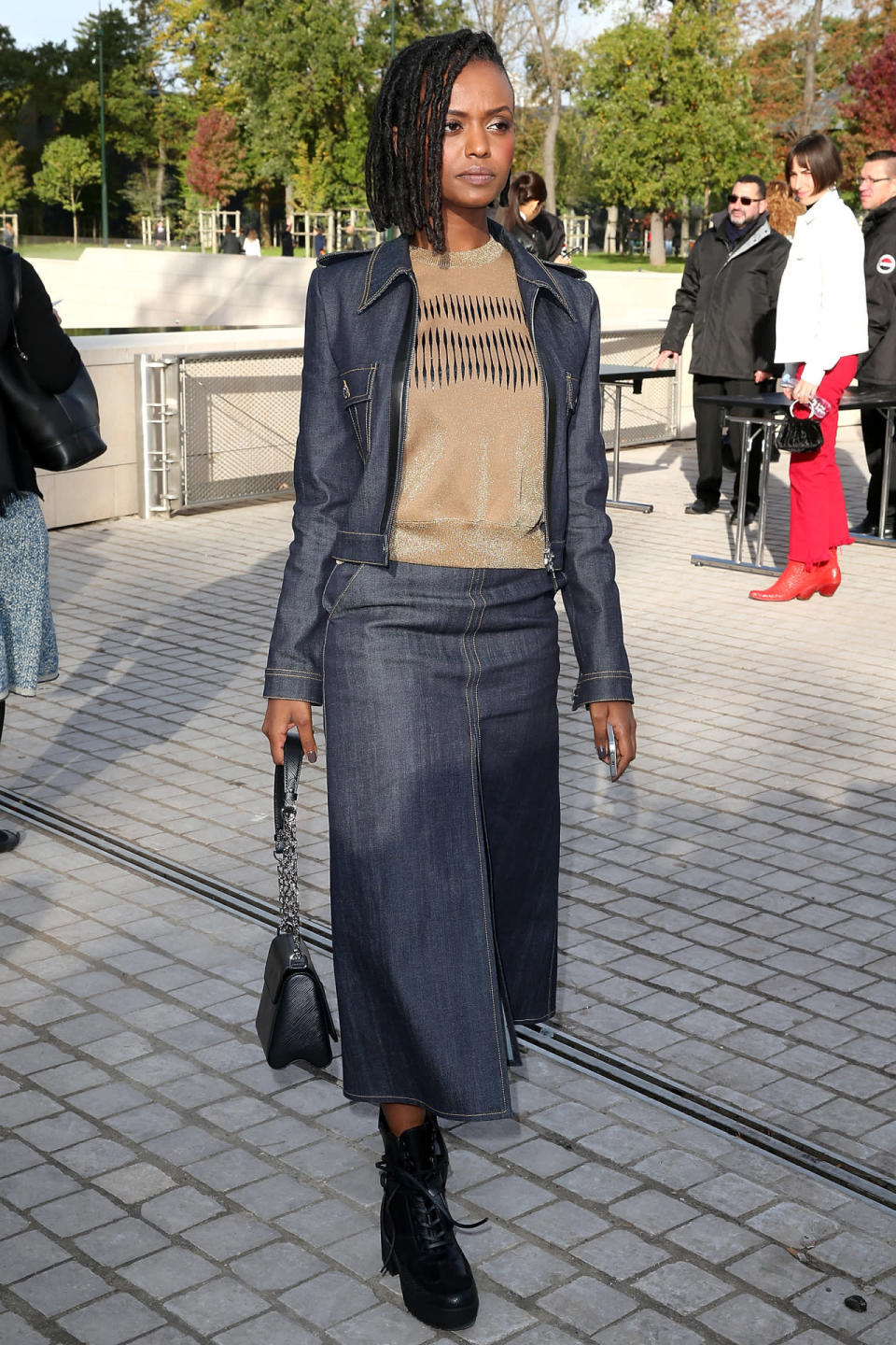 Singer Kelela in a Louis Vuitton denim jacket and skirt. 